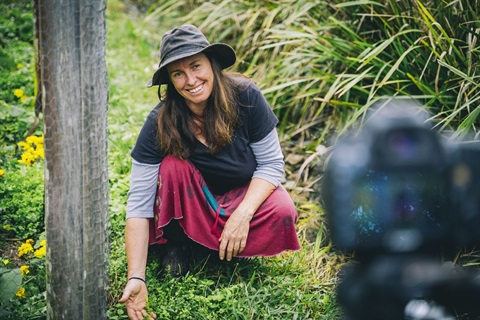 Filming-Karla_crouched-in-garden_1.jpg